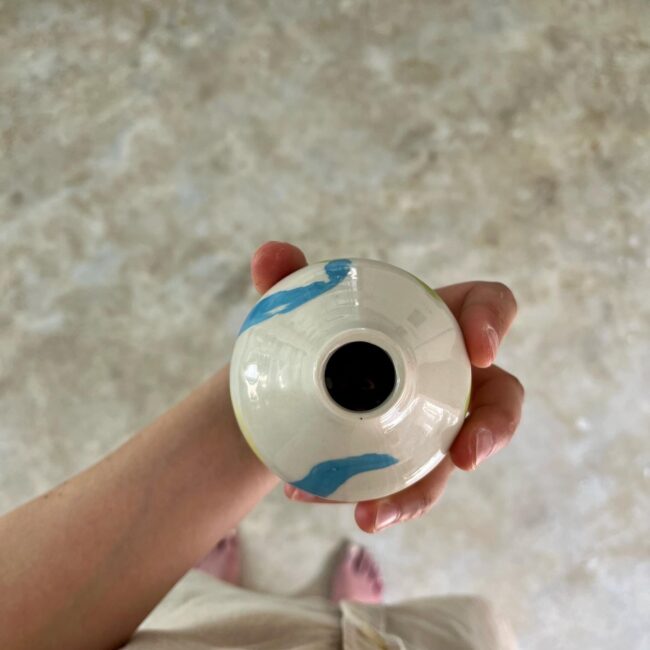 Wheel thrown mini vase from white clay with unterglaze, at Mond, Sri Lanka by Antonia Hinterleitner - pot.tonic