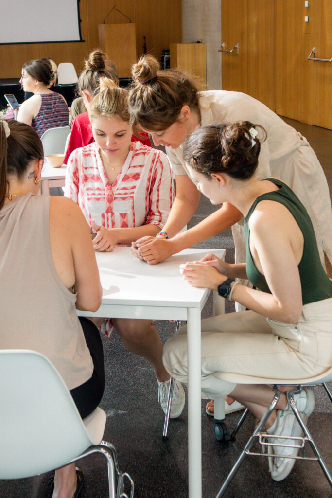 Antonia Hinterleitner explaining how to wedge clay at Universalmuseum Joanneum for pot.tonic; Credit: Theresa Koppler