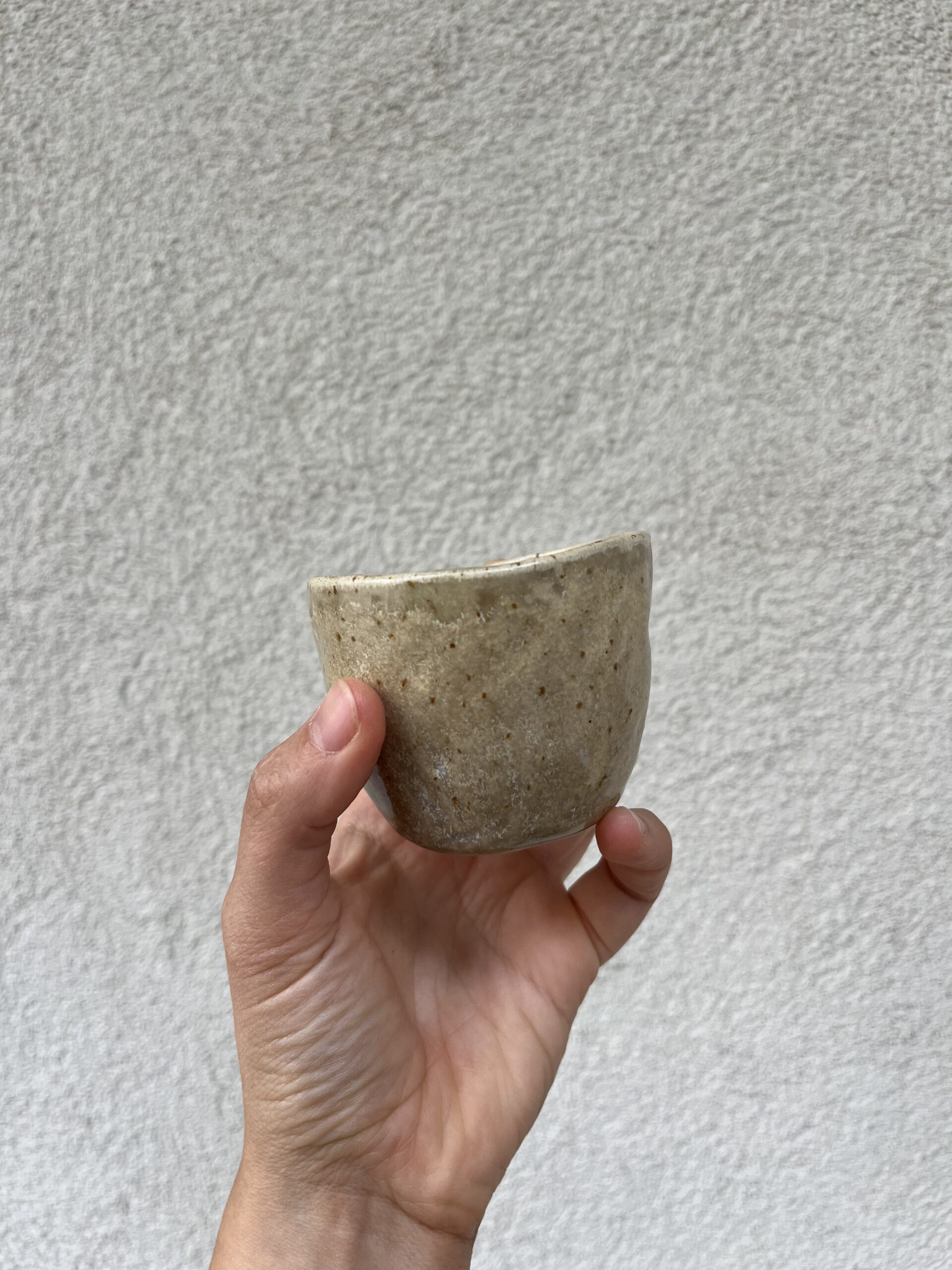 Handbuild cup in speckled clay created in clay workshop by pot.tonic
